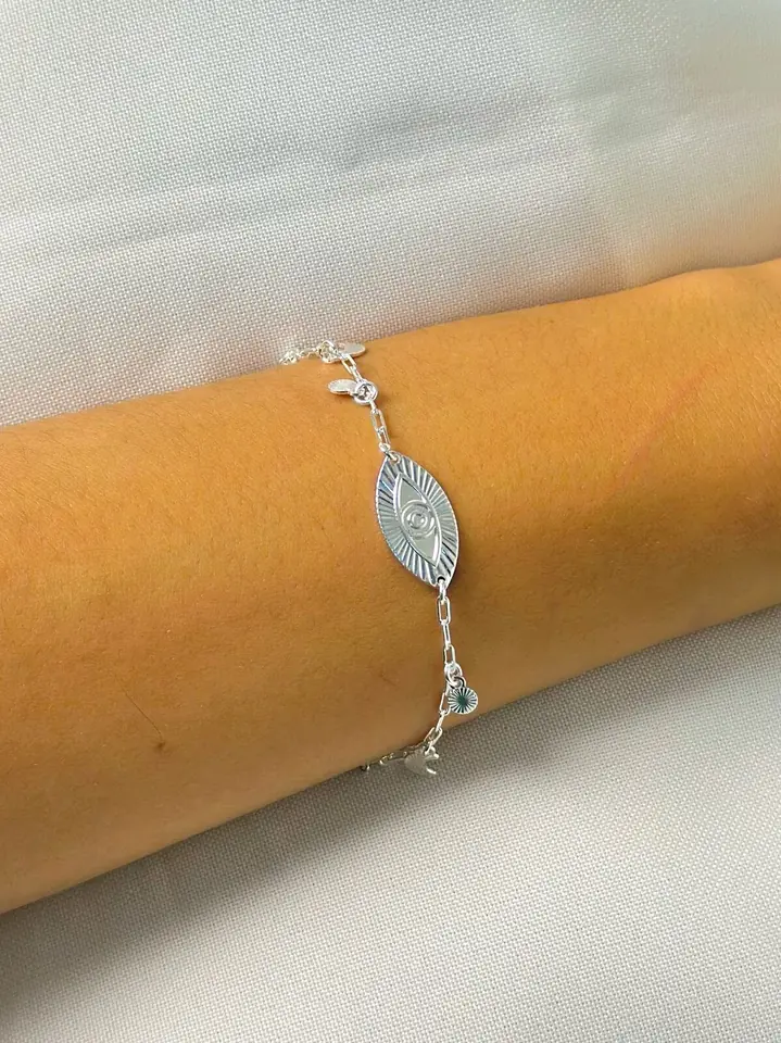 Pulsera dije ojo griego - mini estrellitas y luna