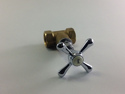 Llave de paso bronce 1/2 volante cruz cromado.