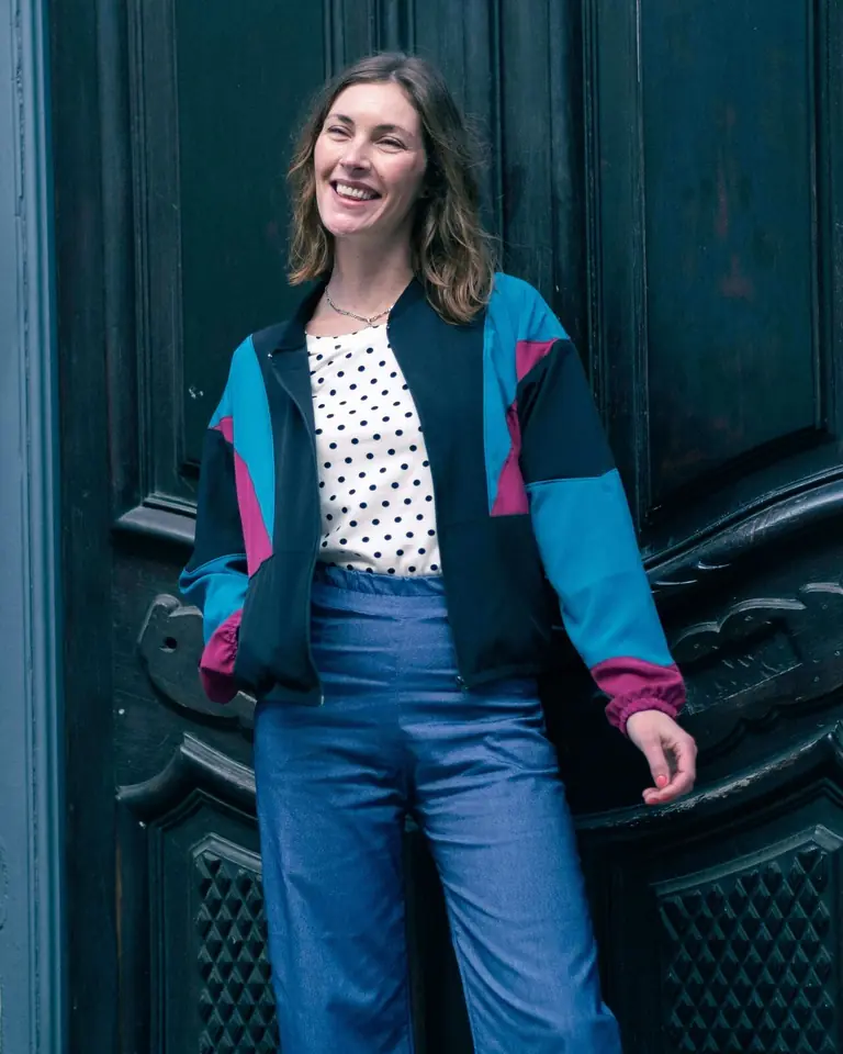 Campera Selva corta viento Negra/Magenta/Petróleo