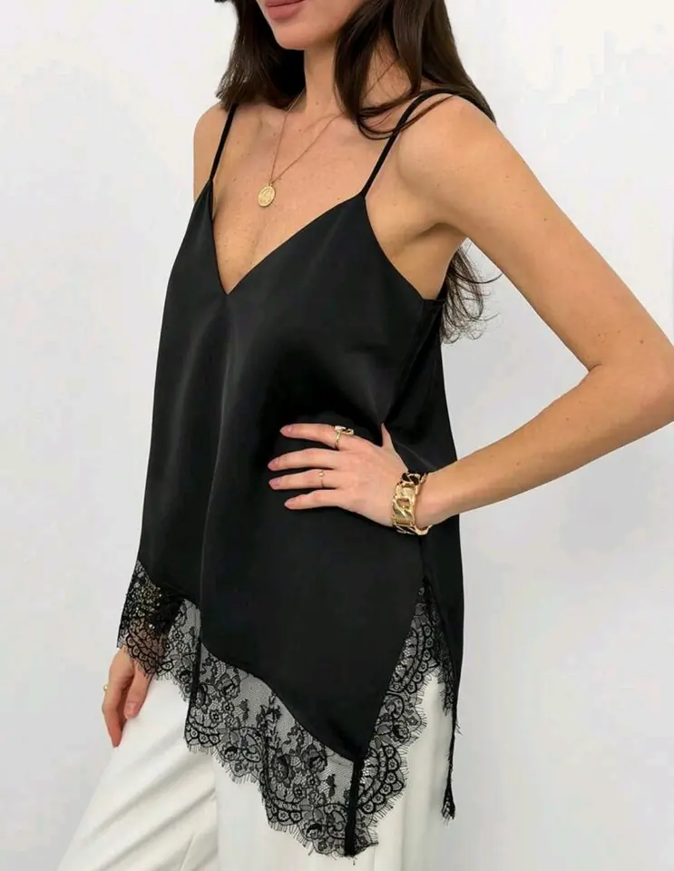 Blusa negra asimétrica con encaje 4 XL