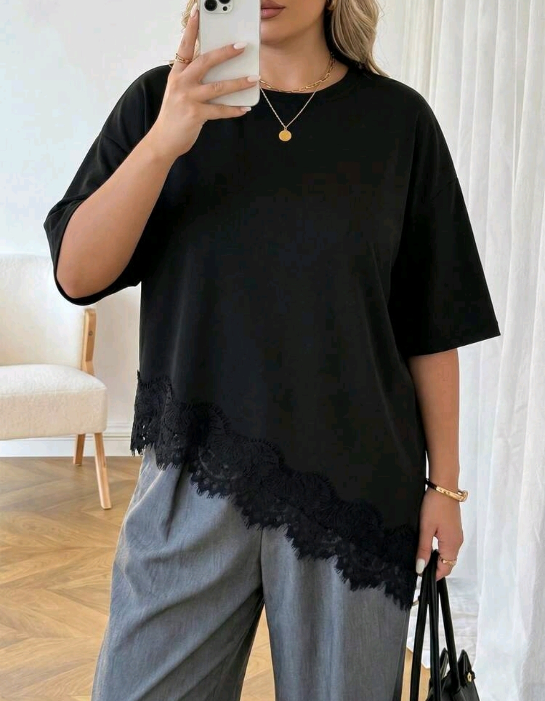 Blusa negra asimétrica con encaje 4 XL