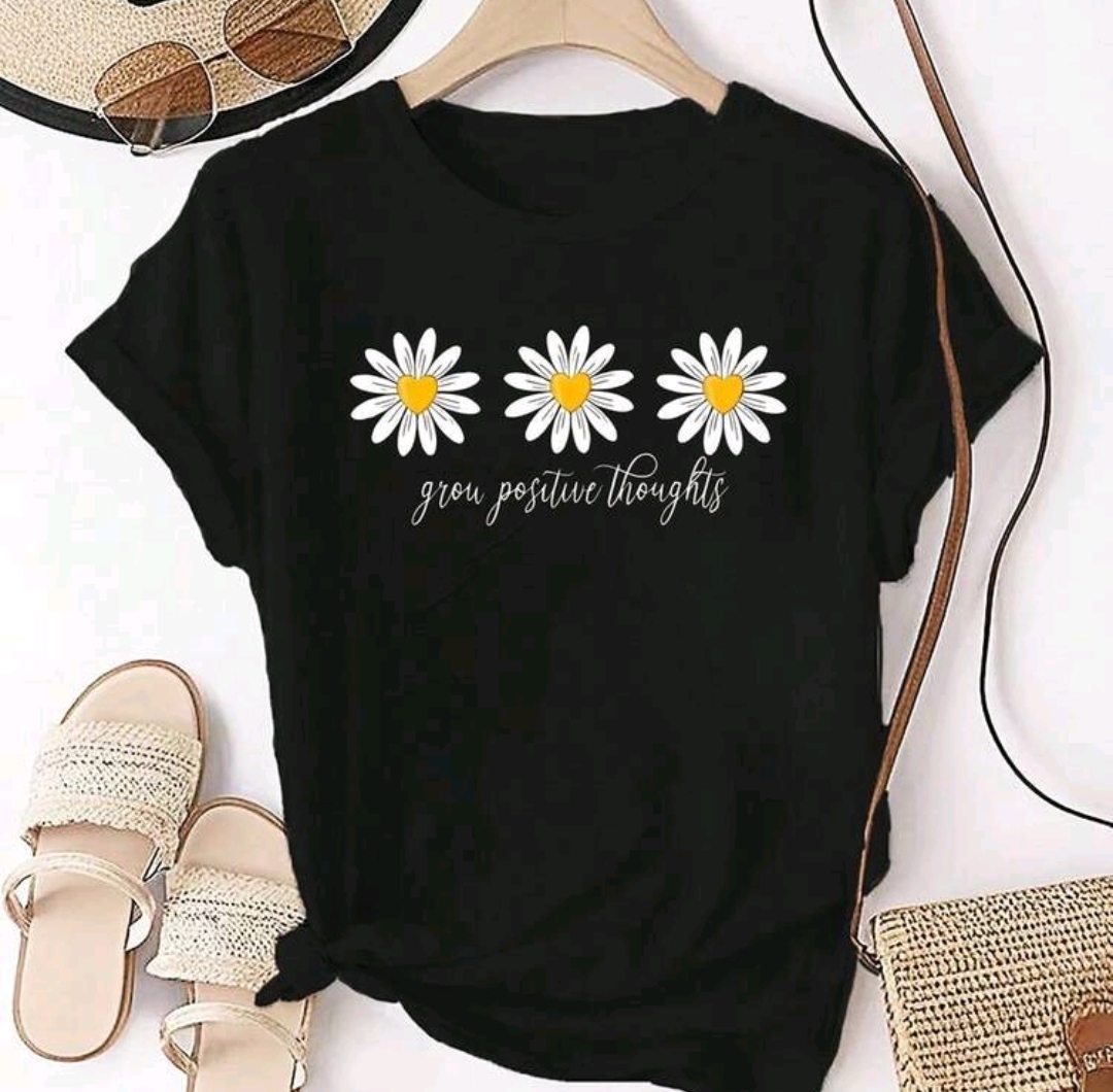 Remerón negro de algodón estampado: flores