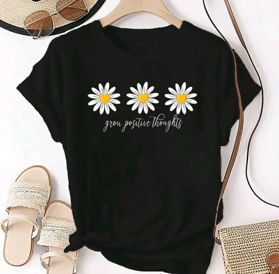 Remerón negro de algodón estampado: flores