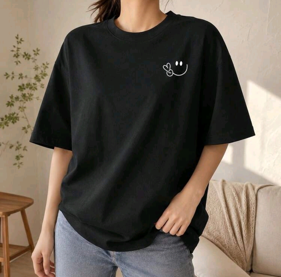 Remerón negro de algodón estampado: carita