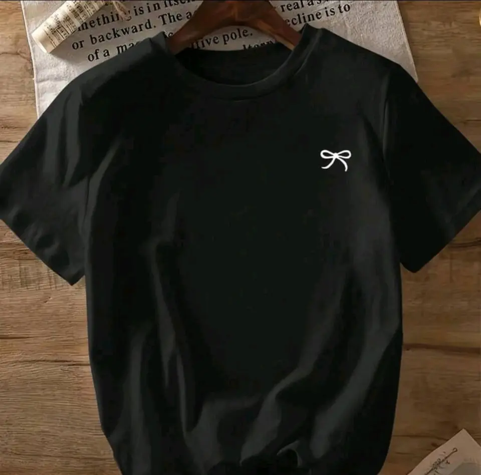 Remerón negro de algodón estampado: moñita