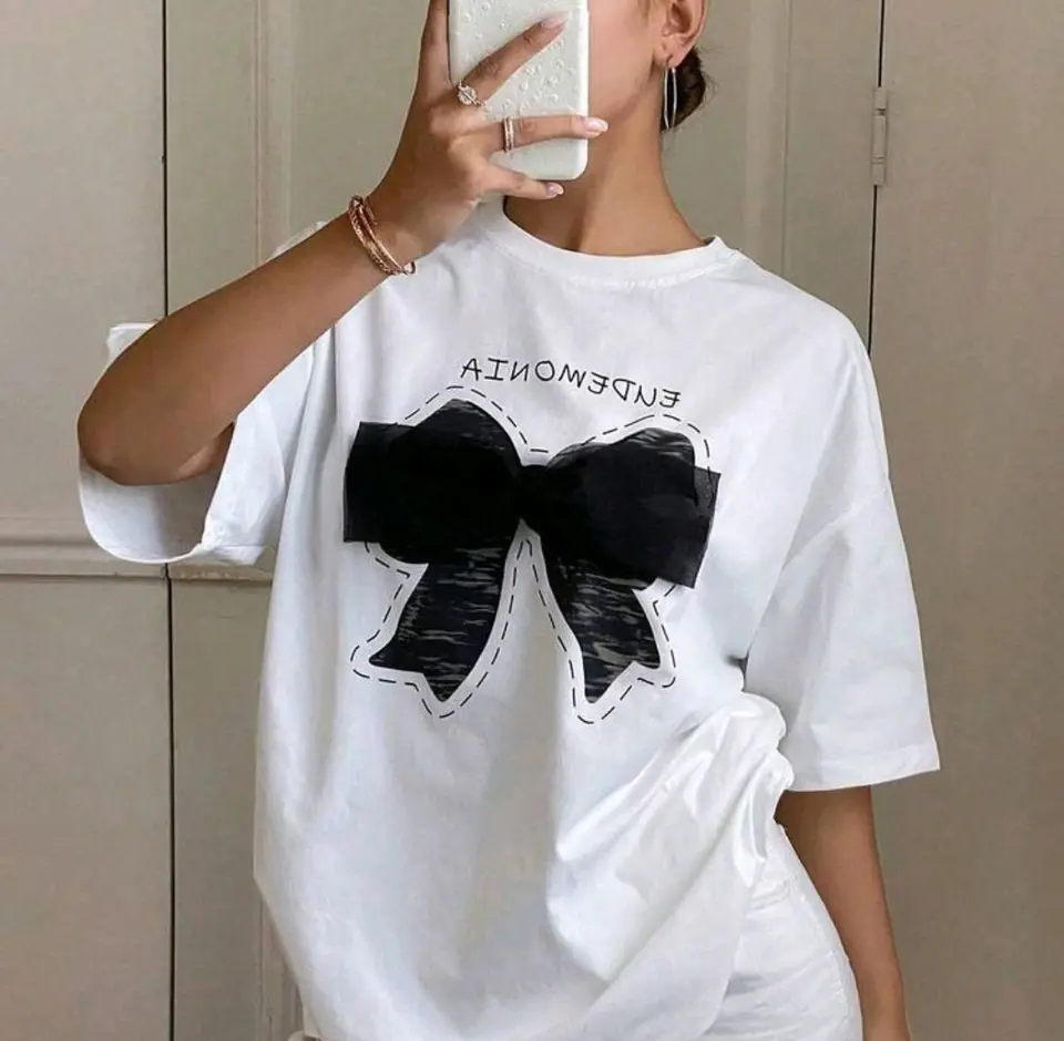 Remerón blanco de algodón estampado: moña