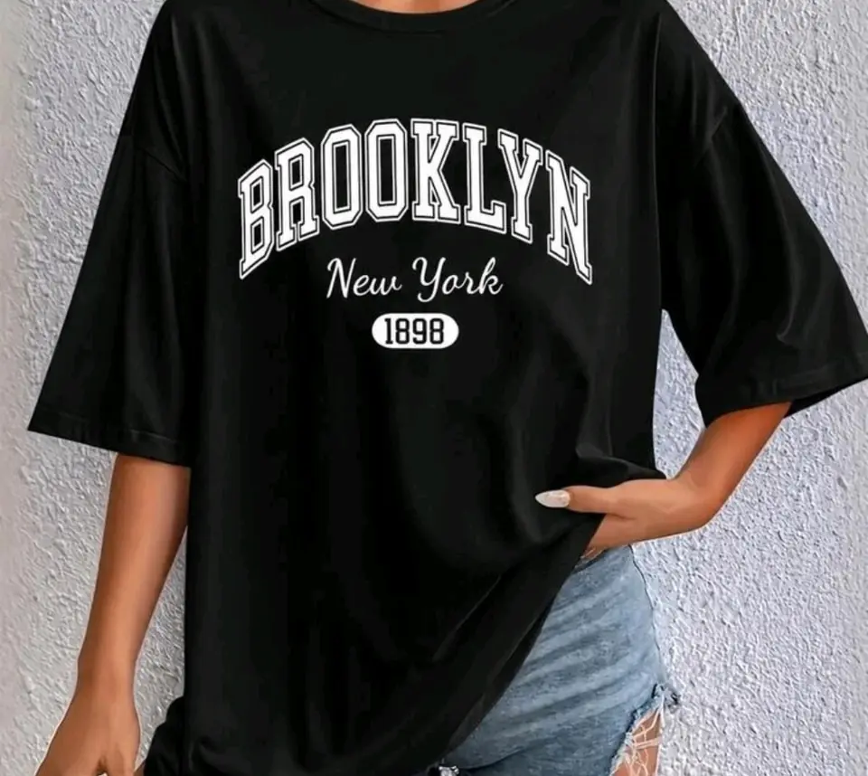 Remerón negro de algodón estampado: Brooklyn