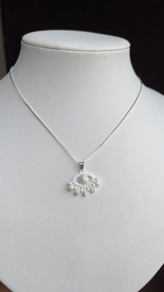 CADENA CON DIJE OJO