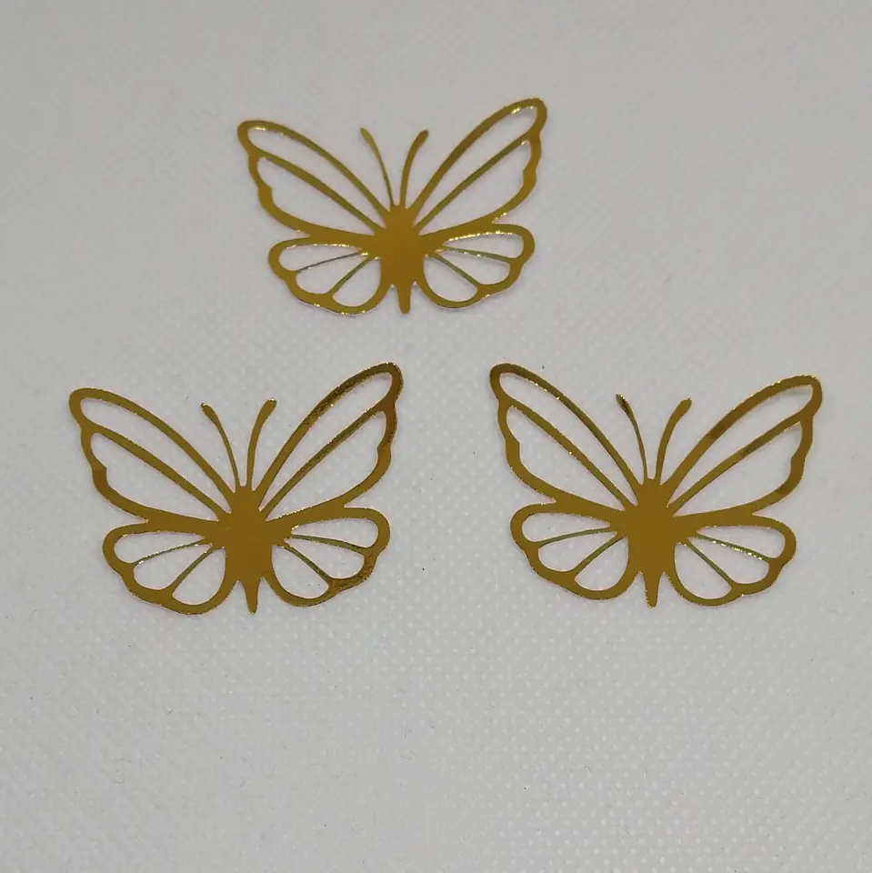 Mariposas caladas en cartulina metalizada