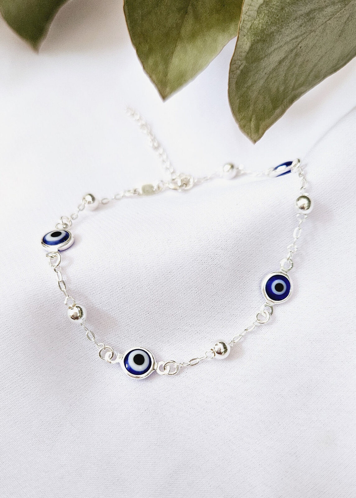 Pulsera protectora mini ojitos