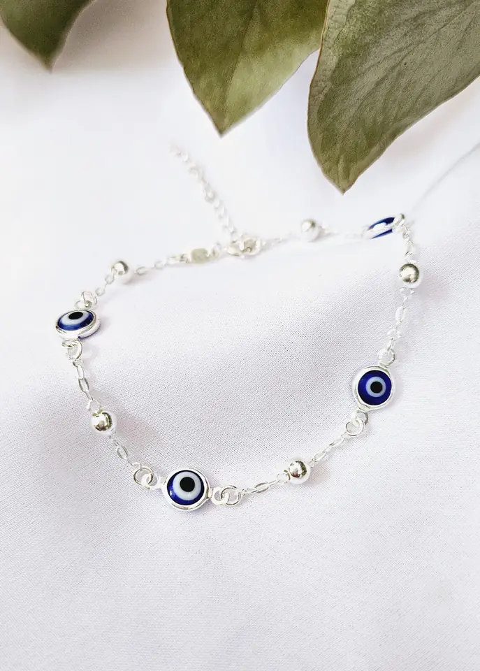 Pulsera protectora mini ojitos