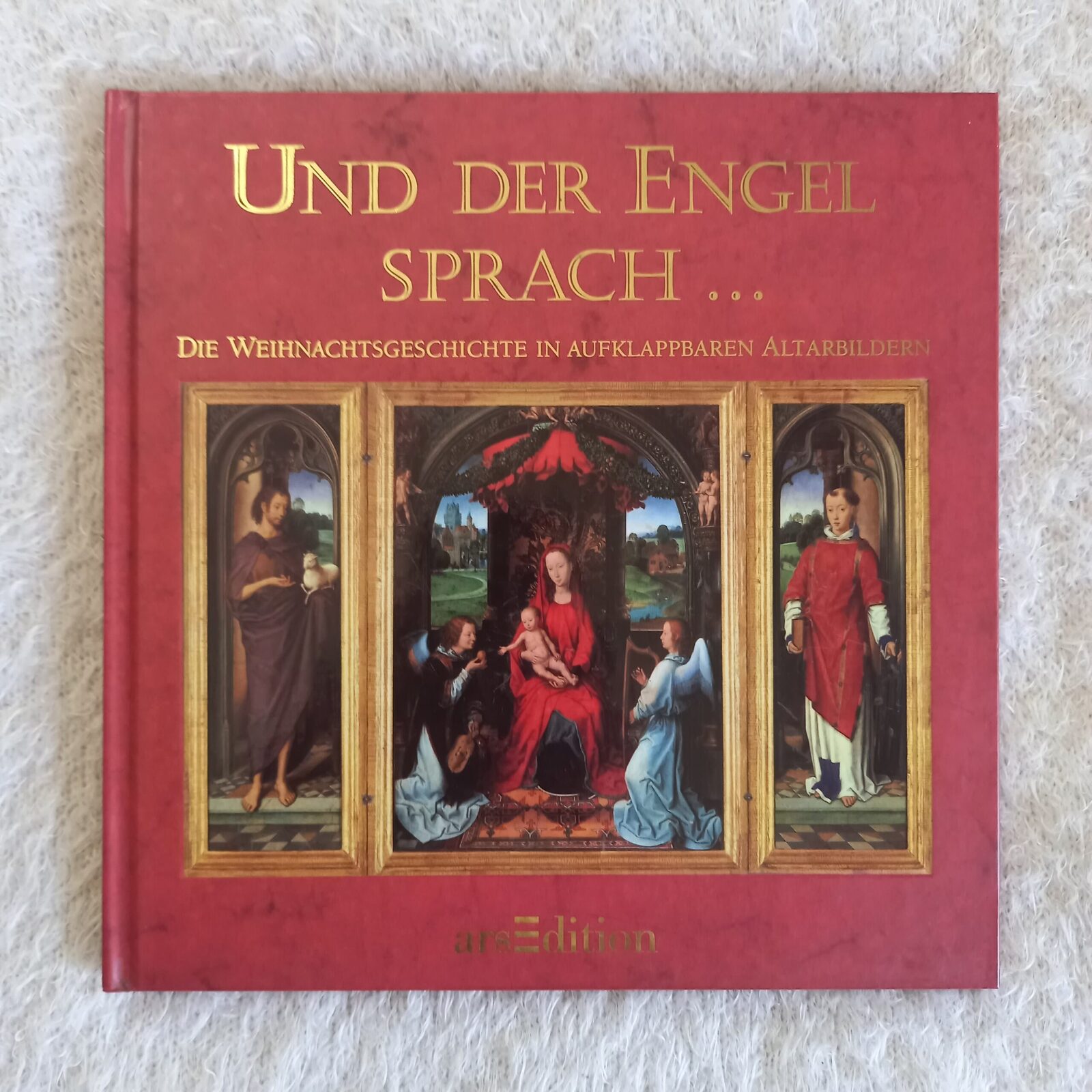 Y el ángel habló... Historias de Navidad en Retablos. Und der Engel sprach... Die Weihnachtsgeschichte in aufklappbaren Altarbildern