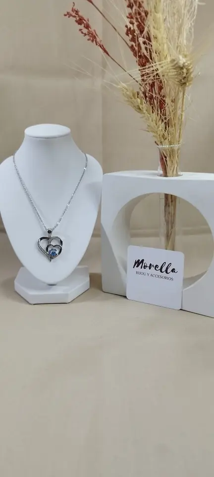 Cadena con dije corazones y patita celeste