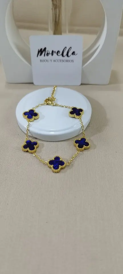 Pulsera trébol dorado azul