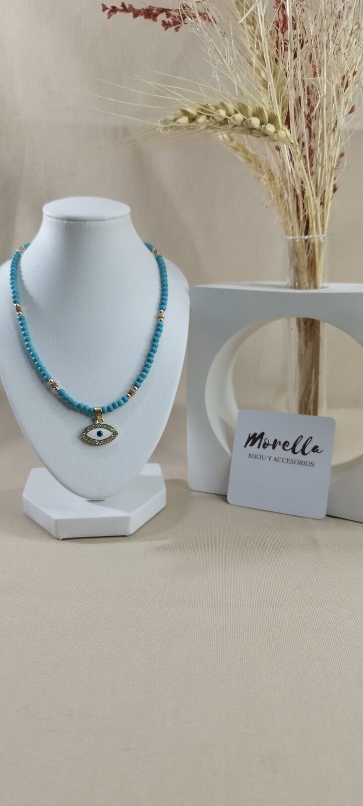 Collar con dije ojo turco