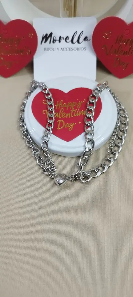 Conjunto pulsera plateada con dije corazon