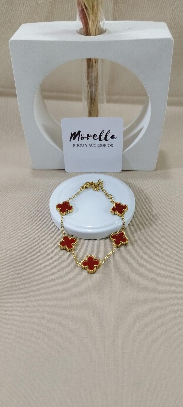 Pulsera trébol  dorado / rojo