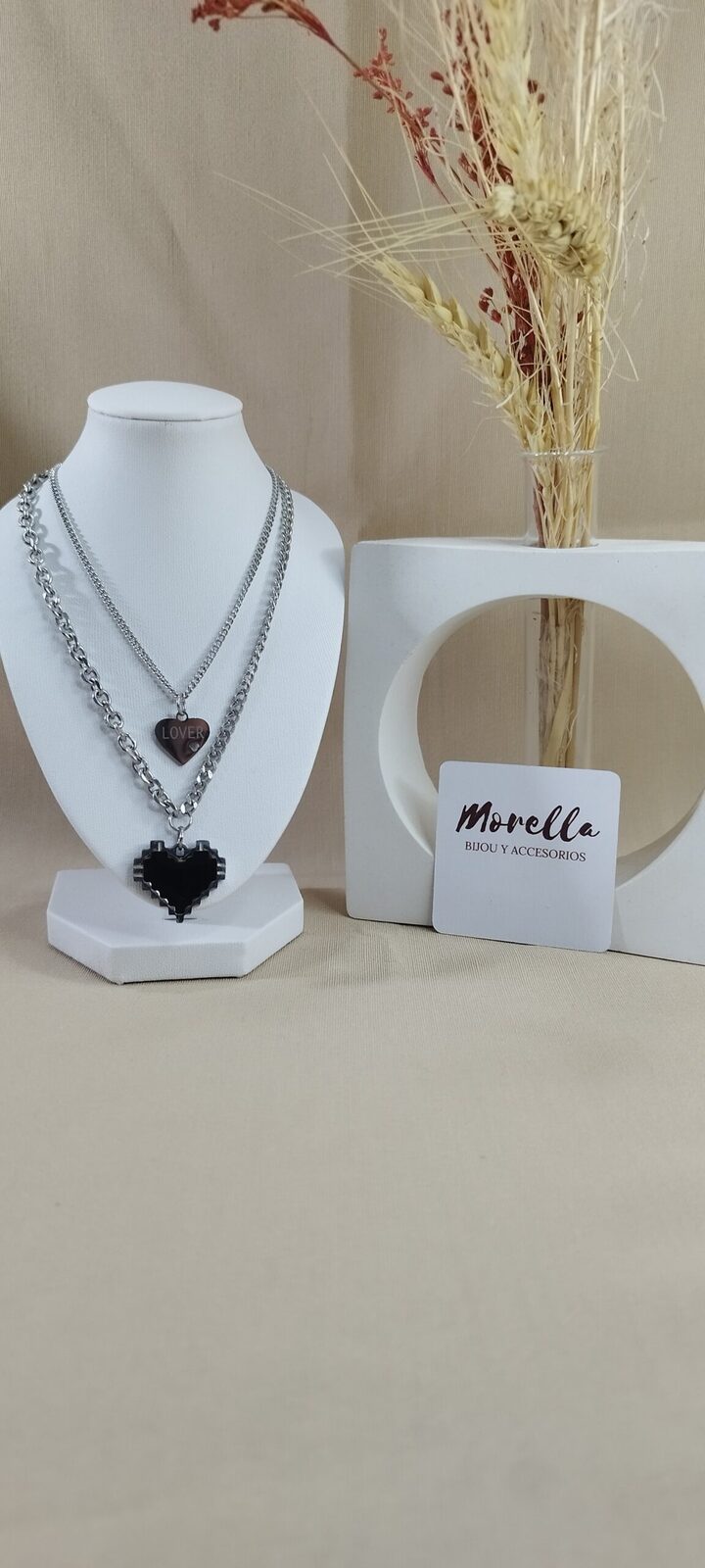 Cadena doble con dijes corazones