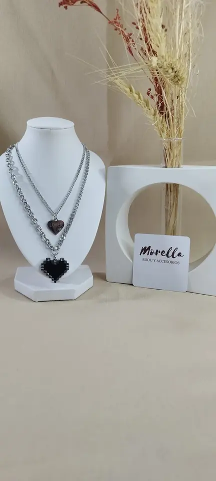 Cadena doble con dijes corazones