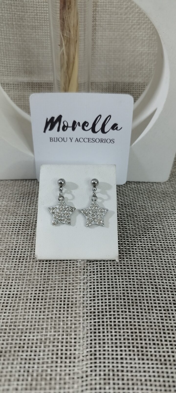 Caravanas con dije estrella