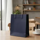 Bolsa de papel azul oscuro para regalos 32x42x11cm
