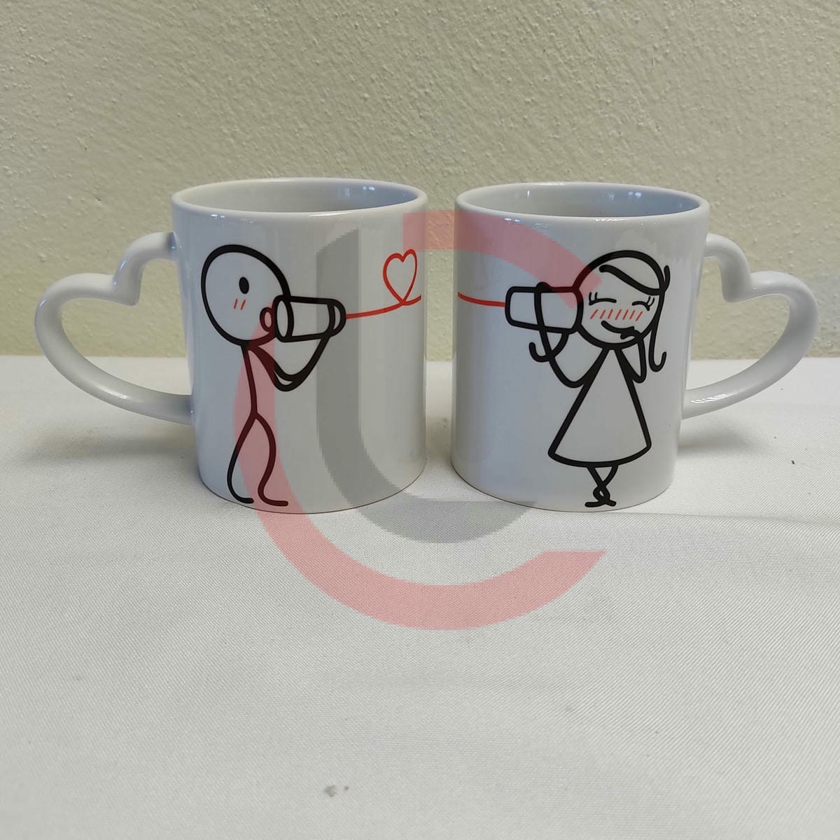 Combo dos tazas blancas con asa de corazón sublimadas