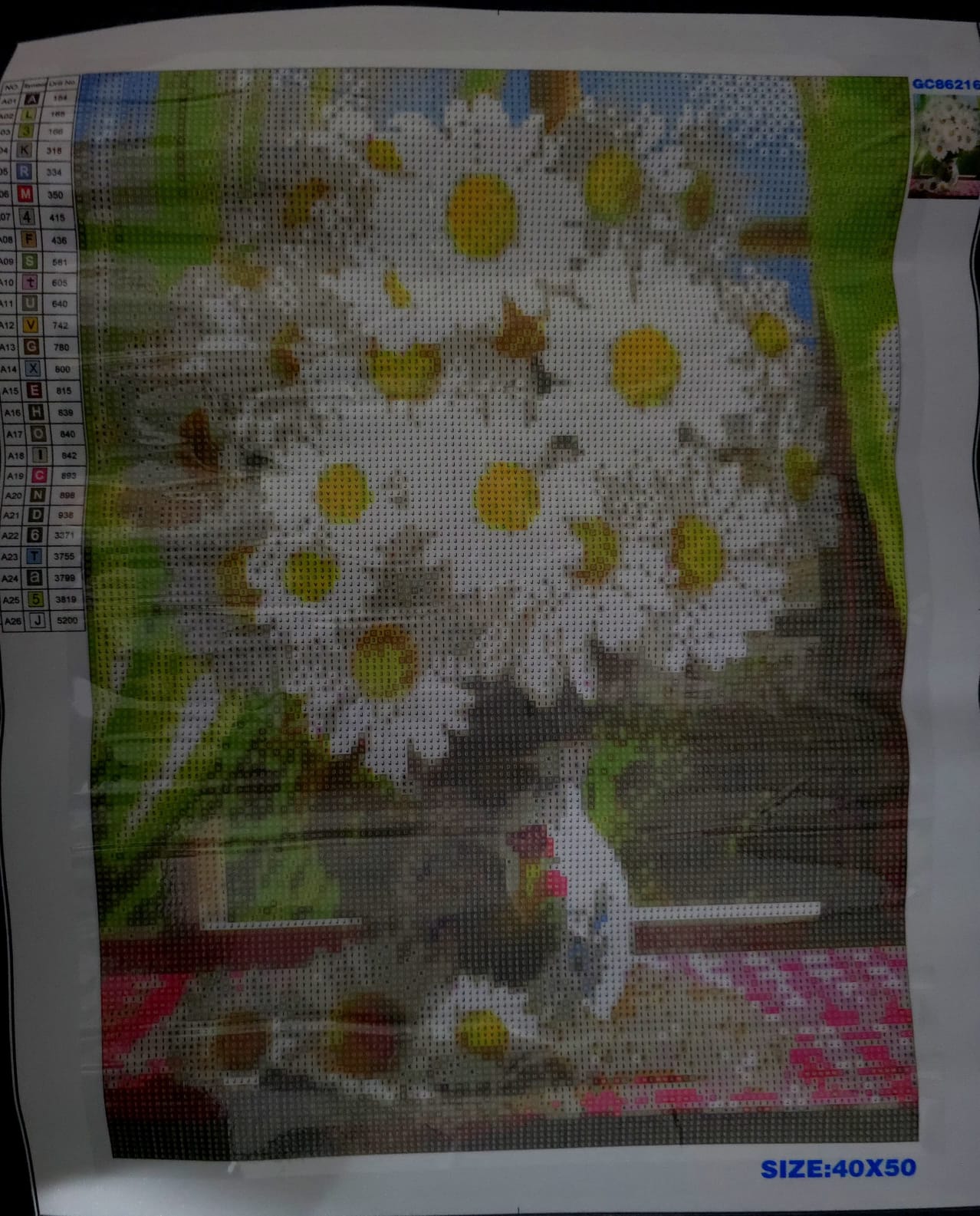 Florero con margaritas, de 40 x 50.