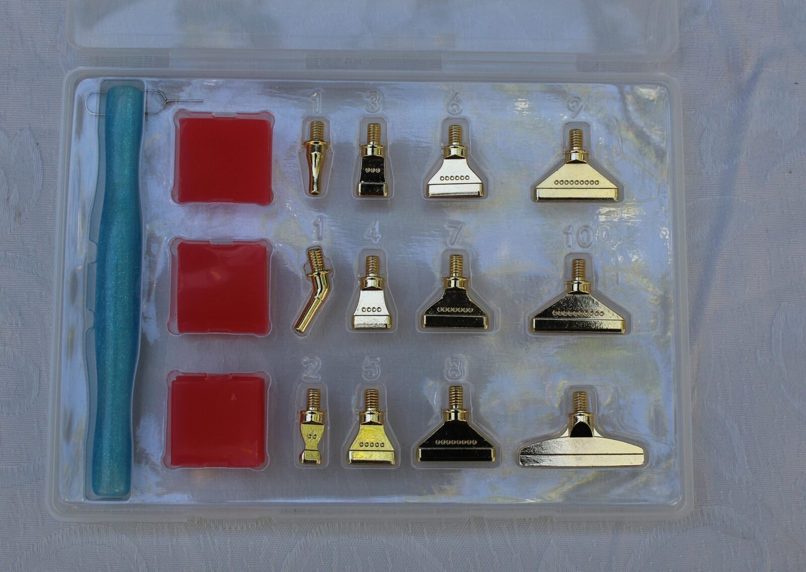 Kit lapiz varias puntas de metal.
