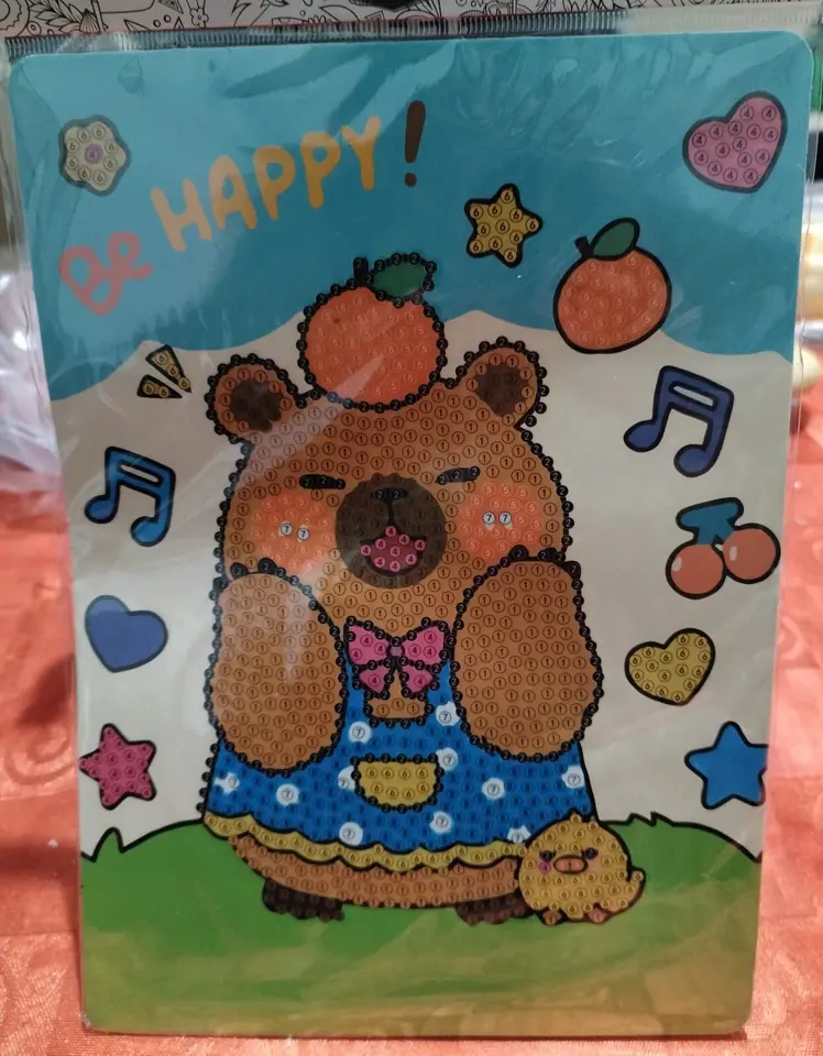 Cuadrito de cartón, capibara música.