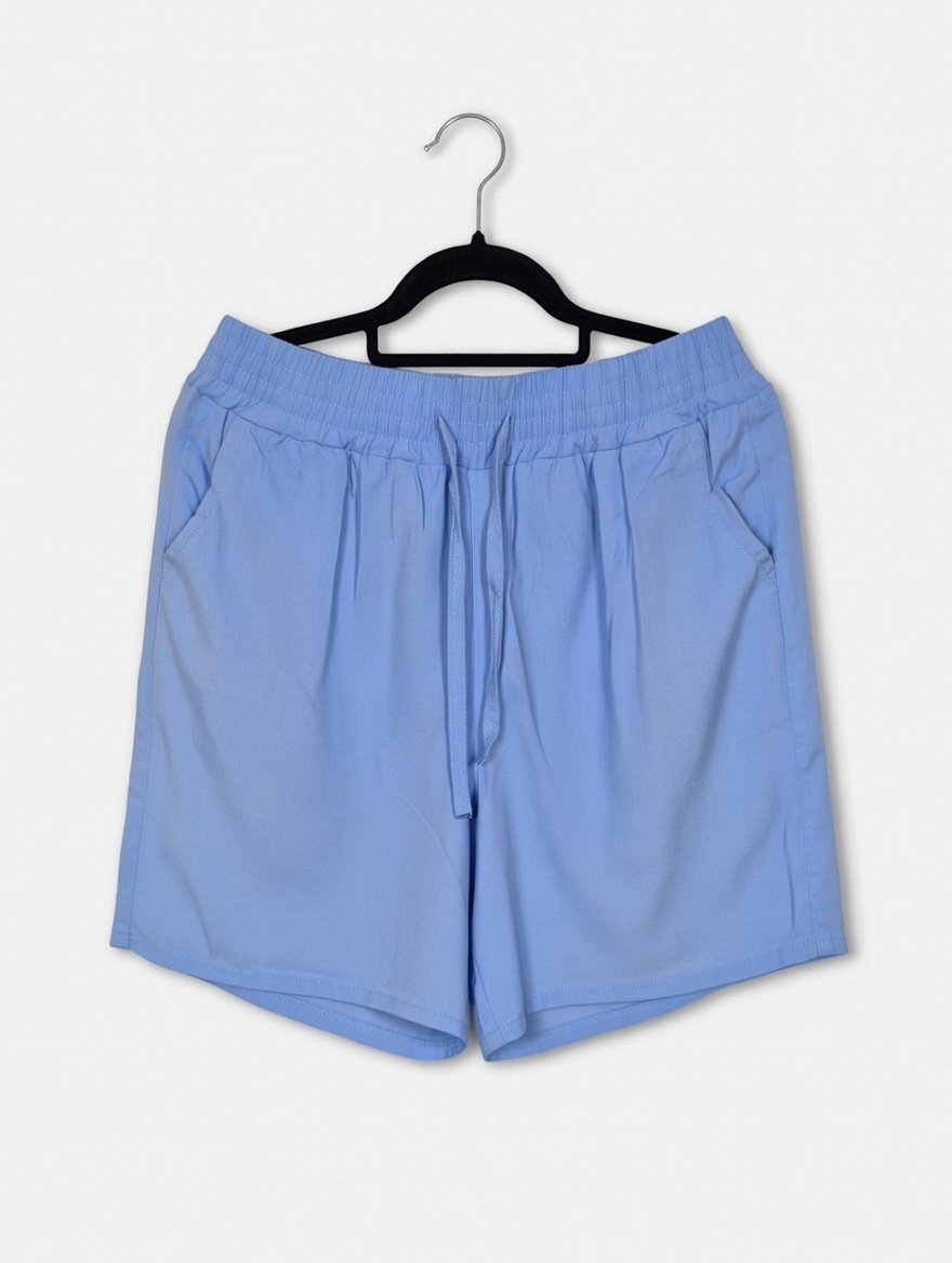 Short en fibrana color celeste (ver medidas en descripción)