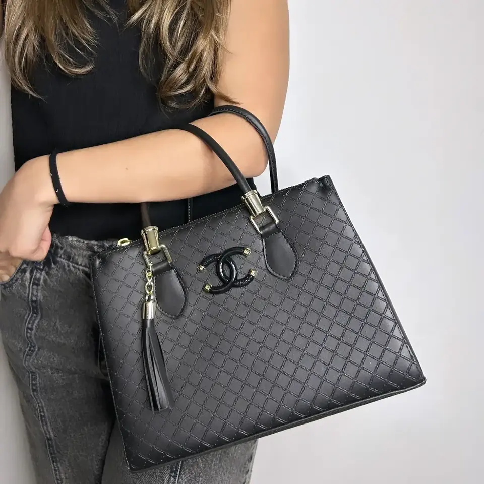 bolso CH con correa larga