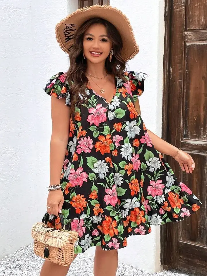 Vestido negro corto con flores anaranjadas,rosas y blancas