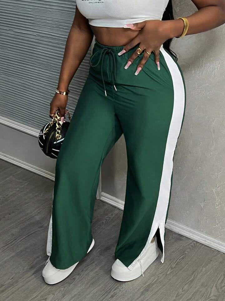Pantalón verde linea blanca con corte al costado