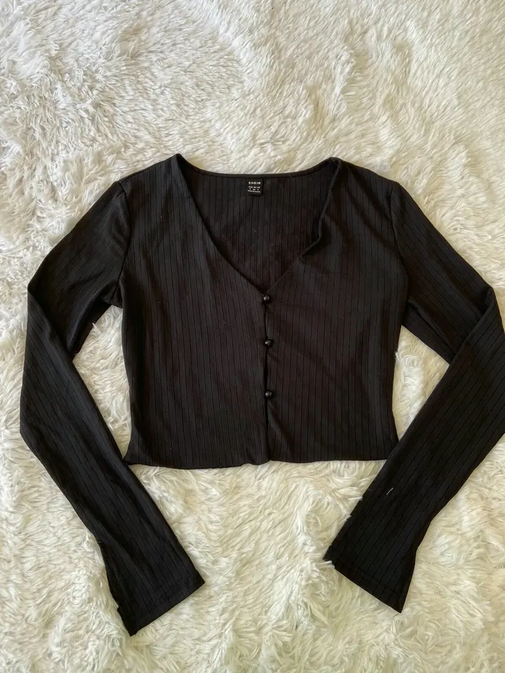 Top tipo saco corto negro
