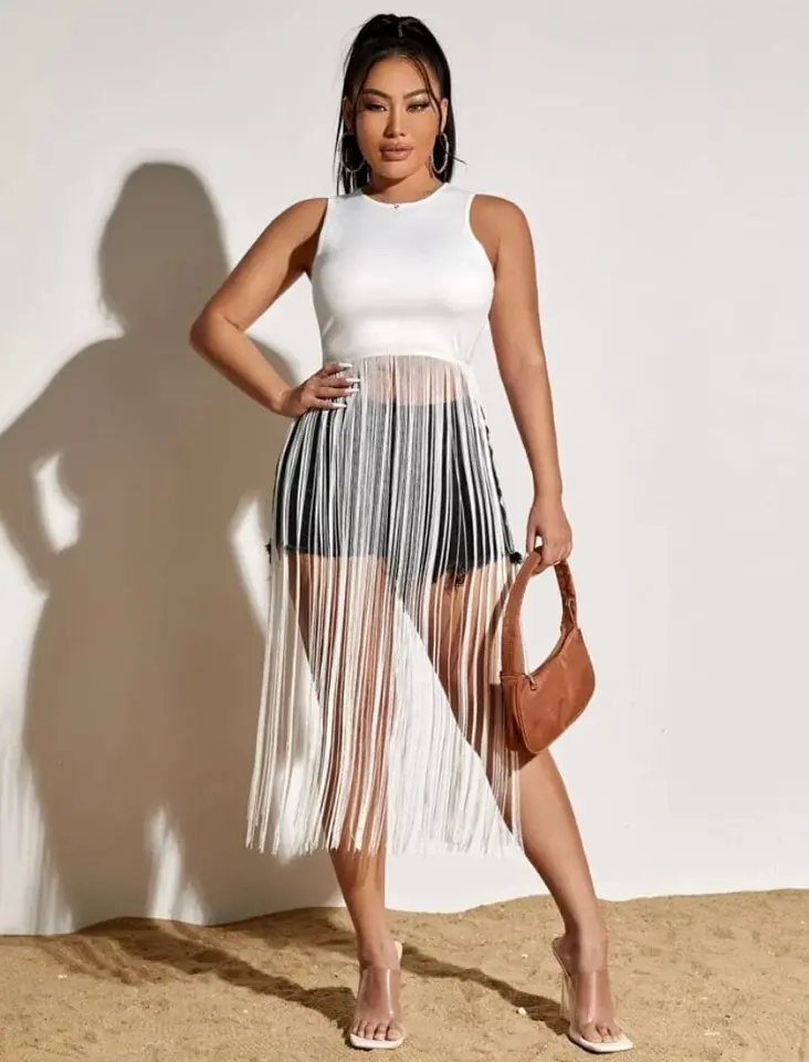Top blanco con flecos largos