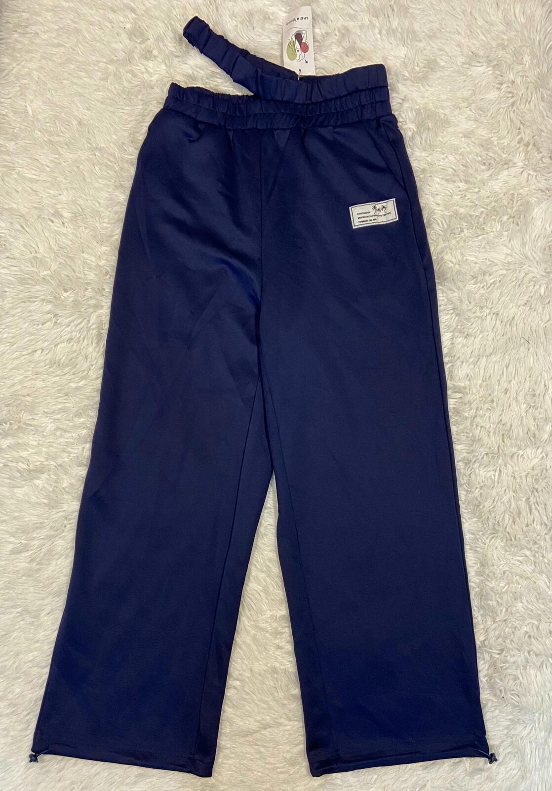 Pantalón azul deportivo pretina con corte