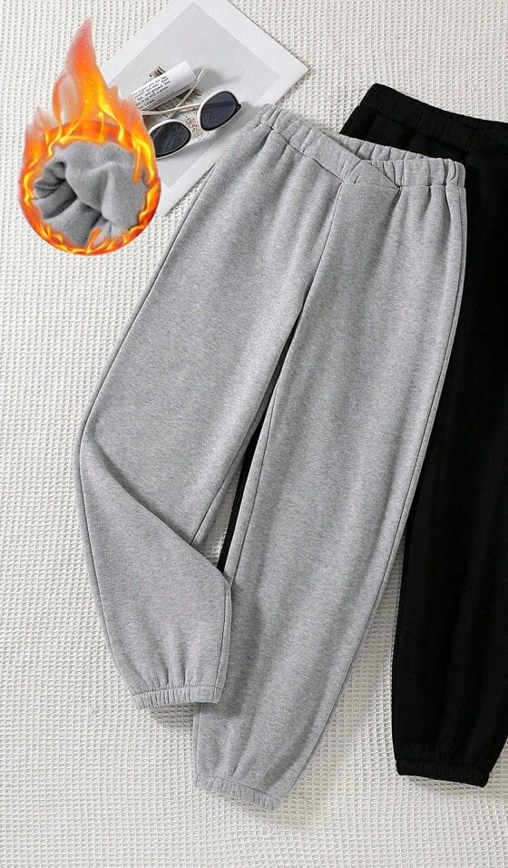 Pantalón gris pretina cruzada con puño