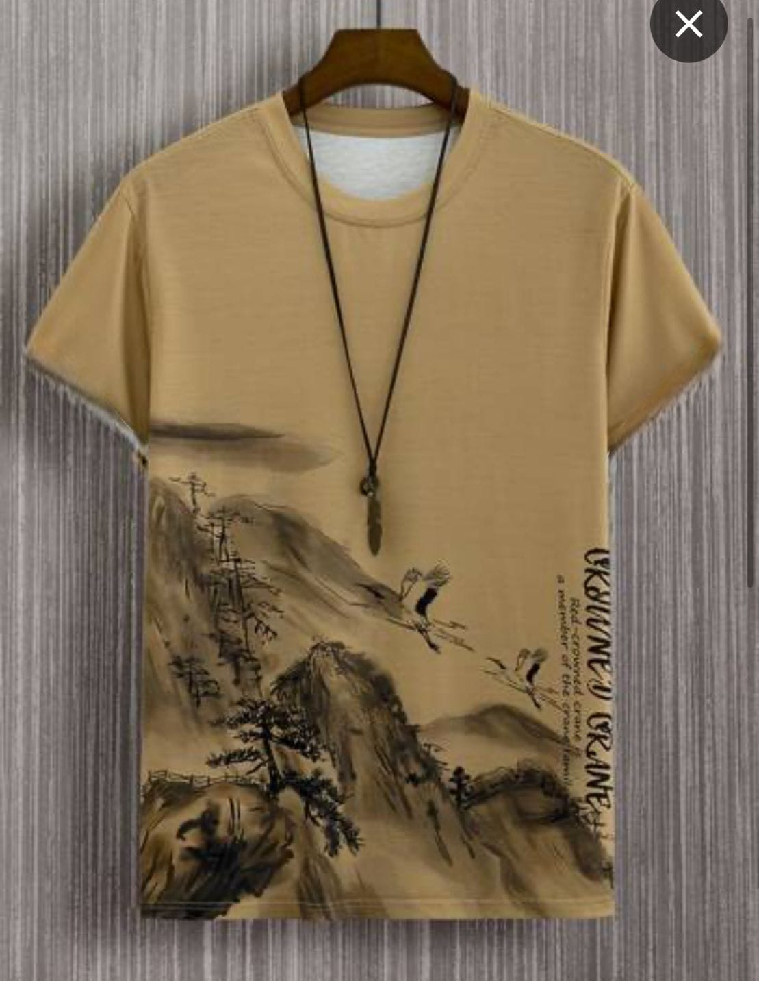 Remera marrón claro con montaña