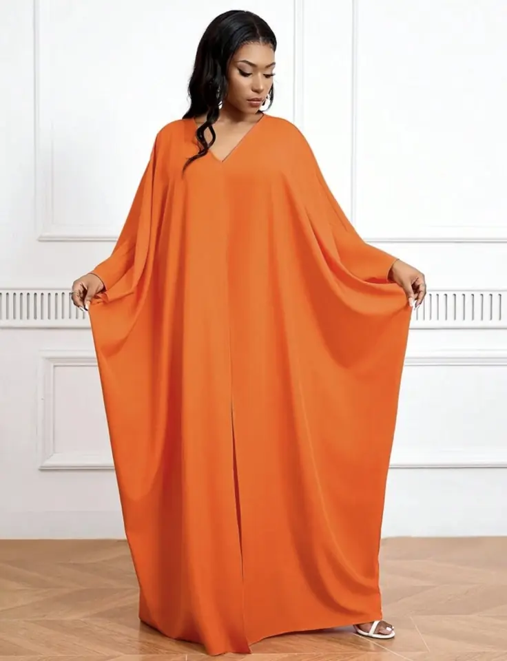 Vestido largo anaranjado apertura en el medio, no incluye pantalón