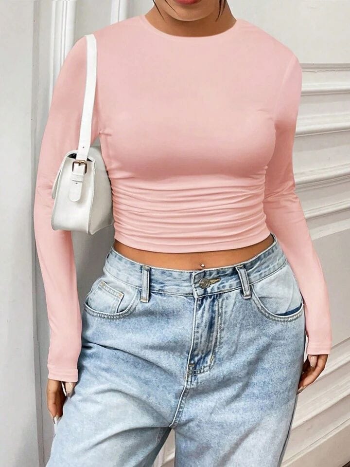 Remera corta manga larga rosa con frunce a los costados