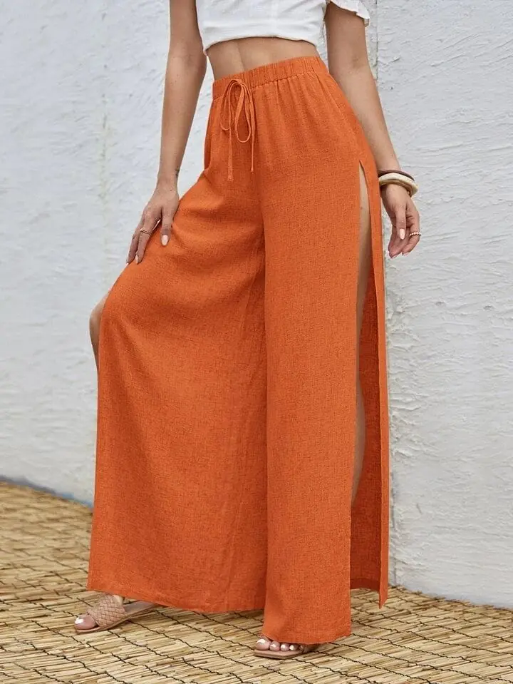 Pantalón anaranjado lino cortes en laterales