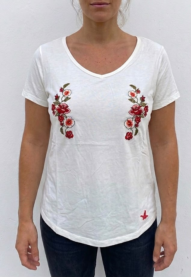 Remera Santa Barbara blanca con flores